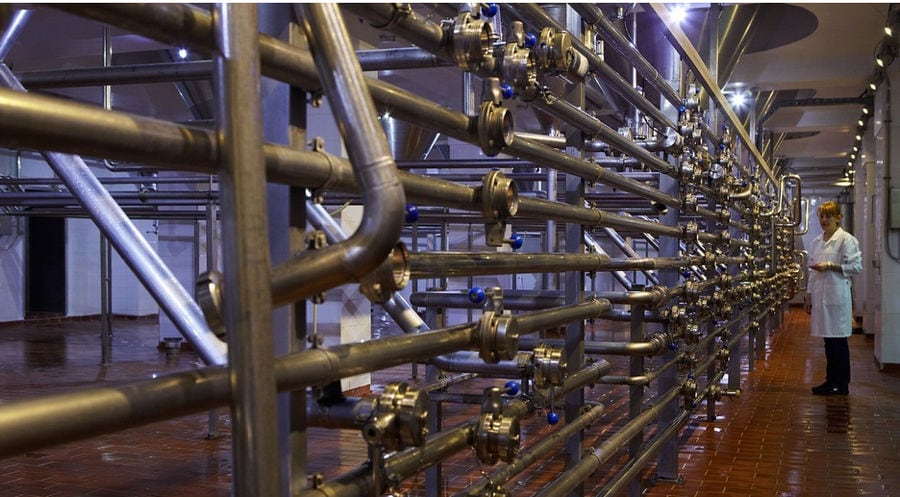 woman supervising the beer brewing system at 'Vergina Beer' plant